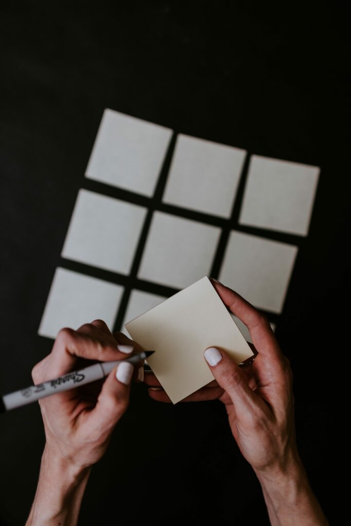 Hands and post it notes